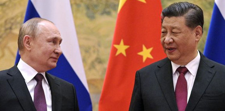 Russia and China open cross-border bridge as ties deepen