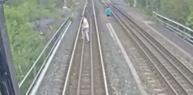 Horrific video: Children narrowly escape from being hit by train