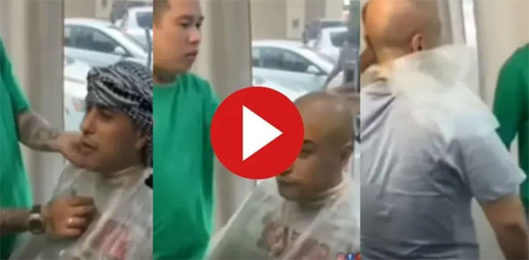 Viral video: Barber slaps man for hilarious reason during haircut