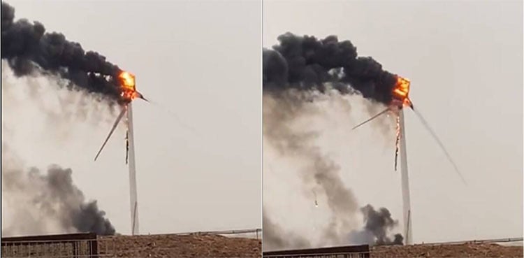 Video shows wind turbine catching fire after being hit by lightning