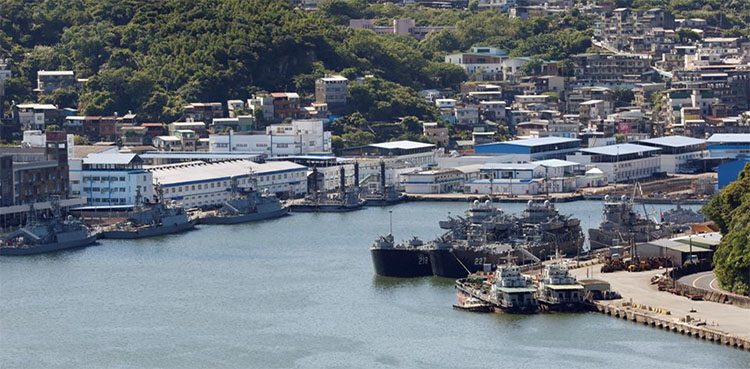 Chinese and Taiwanese warships eye each other as drills due to end