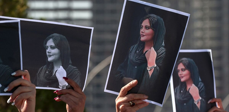 Iranians protest for tenth night, defying judiciary warning