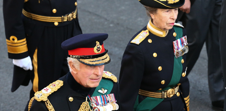 King Charles III leads queen's coffin procession in Scotland