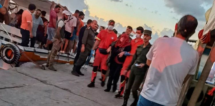 At least 34 dead after migrant boat sinks off Syria