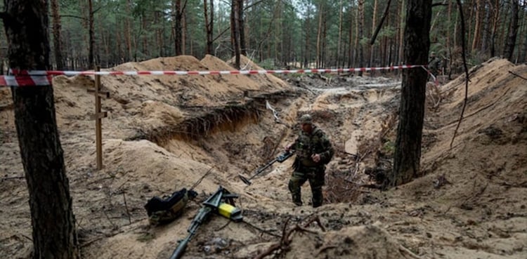 Outrage as Ukraine finds mass grave near liberated Izyum
