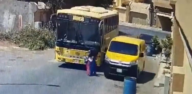 Viral video: Car nearly hits driver, student after overtaking school bus