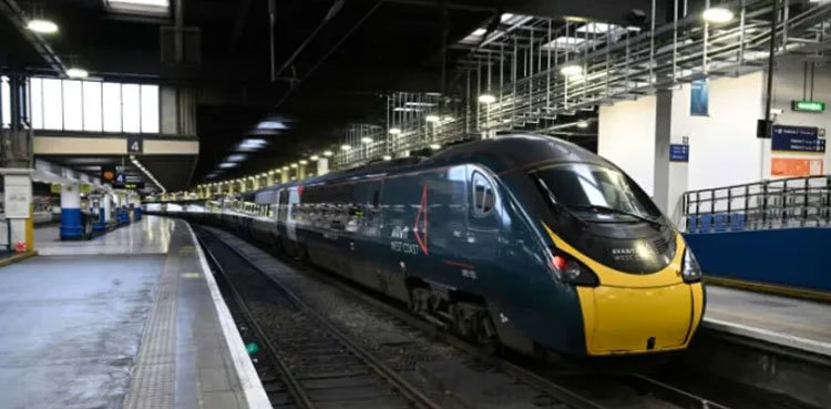 UK police probe mass train stabbing that wounded 10