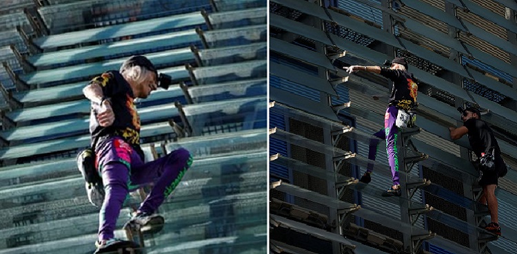 'French Spiderman' climbs Barcelona skyscraper with son - Watch