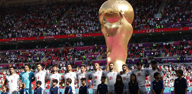 Iran players sing national anthem at FIFA World Cup match