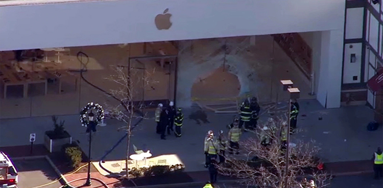 One dead after car crashes into Apple store outside Boston