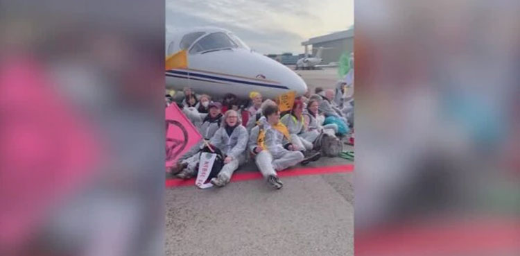 Climate activists block private jets at Amsterdam airport