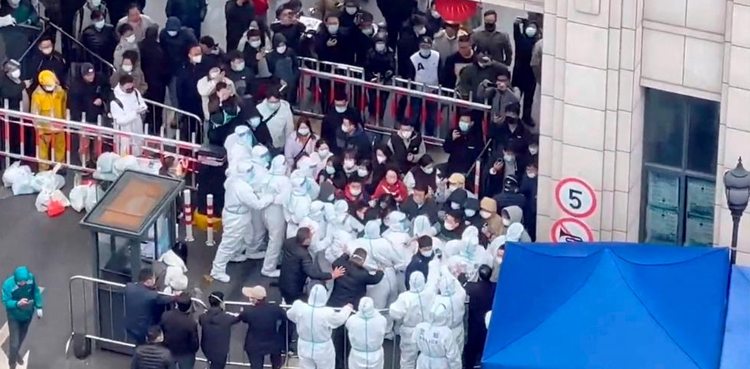 China signals zero-Covid relaxation after protests