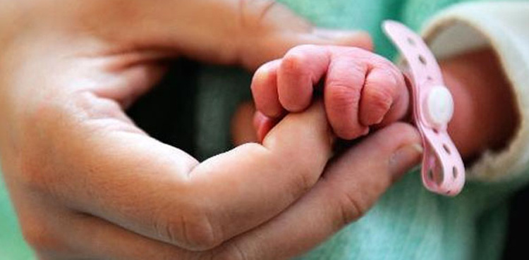 Baby born with 'twin' inside her stomach in rare condition