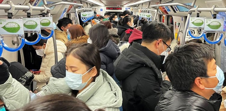 Beijing, Shanghai residents back to work as China eases into living with COVID