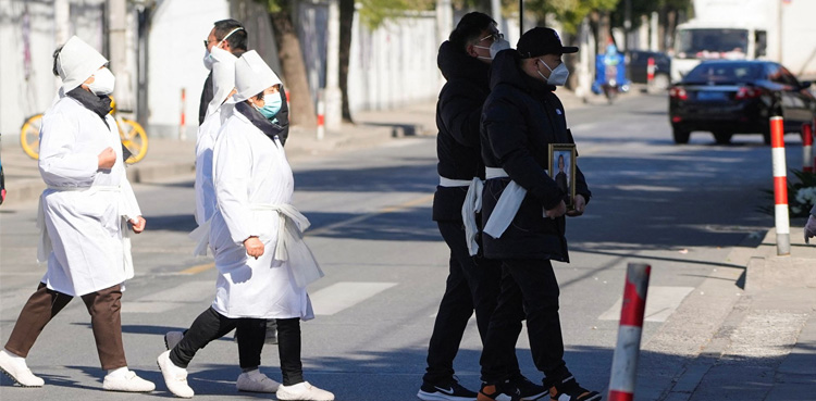 Shanghai asks residents to stay in on Christmas as China COVID surges