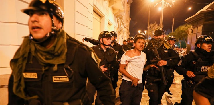 Thousands march in Peru capital demanding president step down