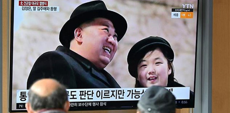 Who is this girl alongside North Korea leader Kim Jong Un?