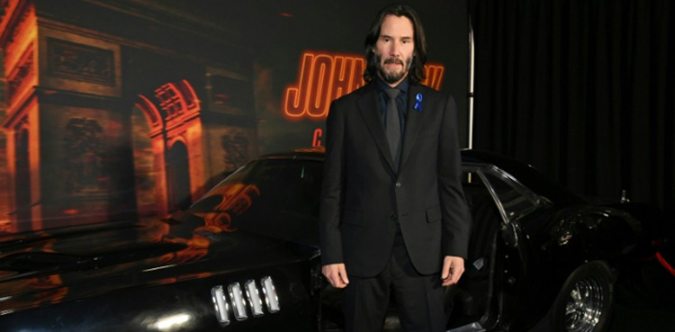 Latest 'John Wick' tops box office in a big, bloody opening