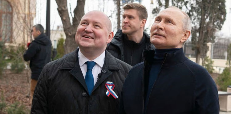 Putin visits Crimea on anniversary of its annexation from Ukraine