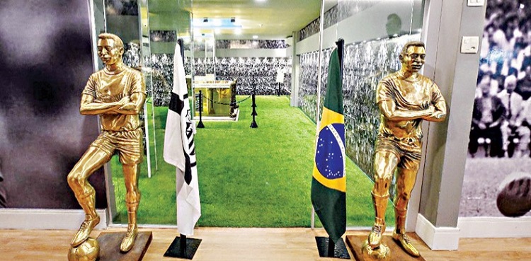 Pele's gilded, turf-lined tomb opens to public in Brazil