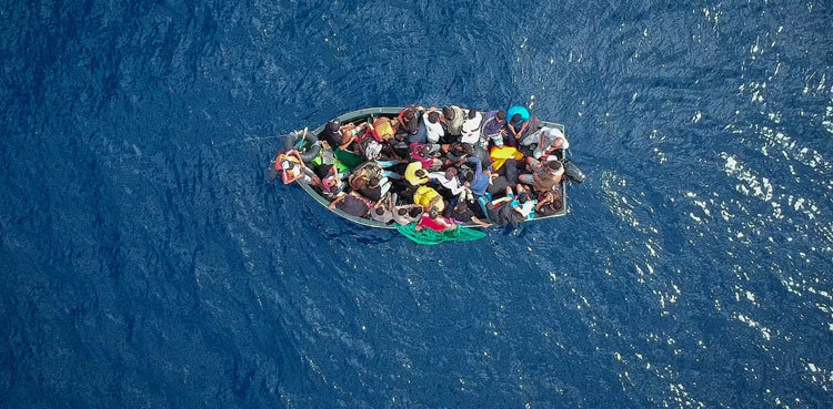 EU wants deal on migrant policy by year-end: Spain