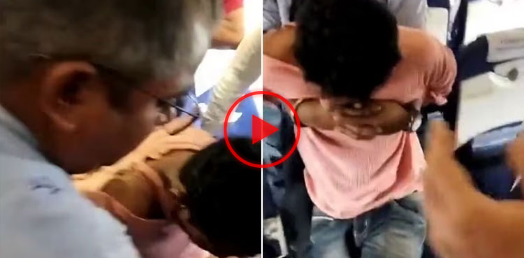 Watch: Passenger tries opening emergency hatchet during mid-flight