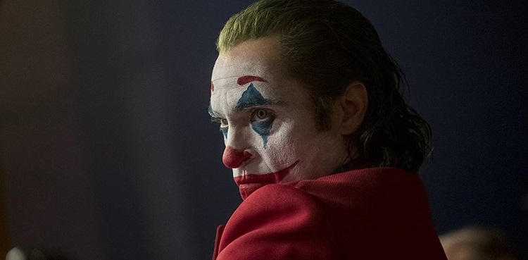 Joaquin Phoenix stands alone in rain in new 'Joker 2' poster