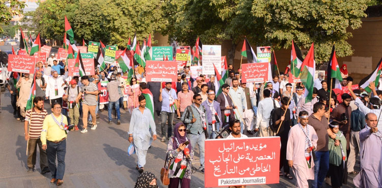 Protesters march in Karachi against killing of journalists in Gaza