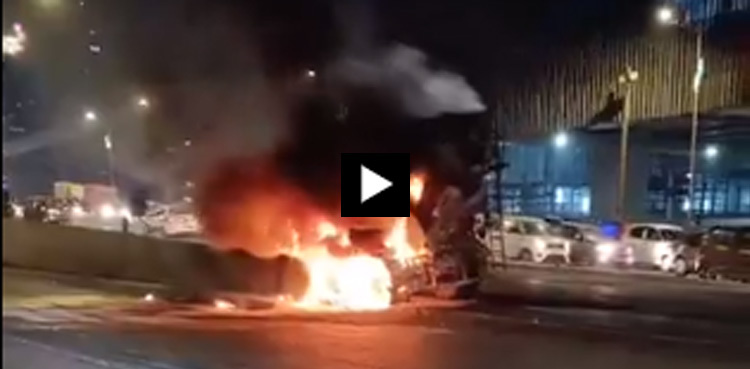 Watch: Moving mixer truck catches fire