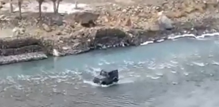 Viral video: Man drives car through river to beat traffic jam