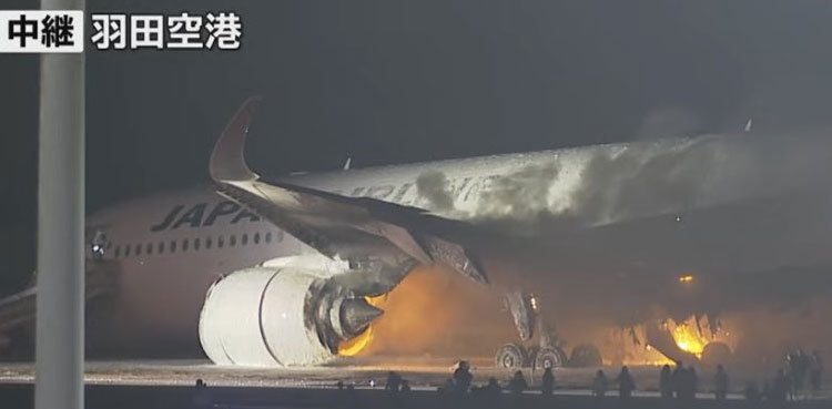 Japan Airlines plane on fire at Tokyo airport; passengers evacuated