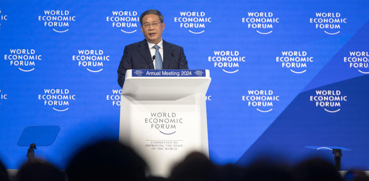 In Davos, Chinese premier takes aim at trade 'barriers'
