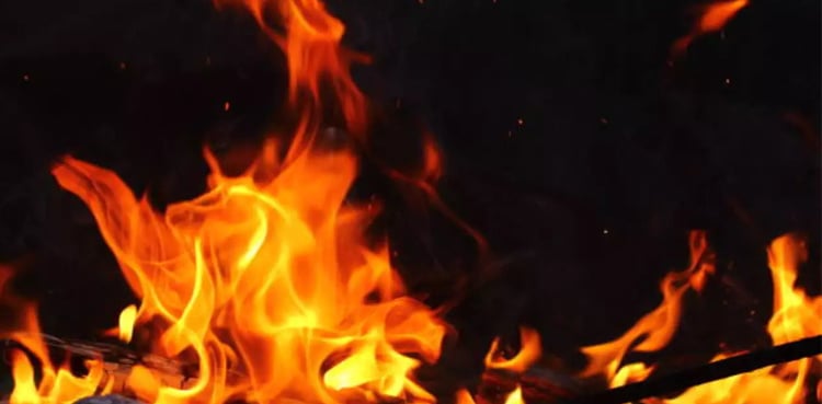 Man sets father on fire for not buying him bike