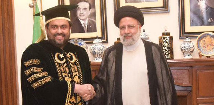 In visit to Karachi, Iranian President conferred honourary PhD degree
