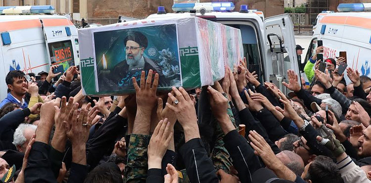 Tens of thousands gather for Raisi funeral procession in Tehran