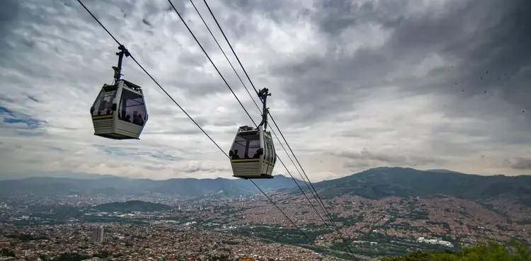 Dozens stuck in cable cars after horrific collapse kills one