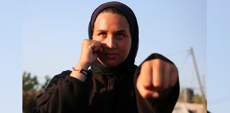 As bombs shatter Gaza, boxing coach emboldens girls