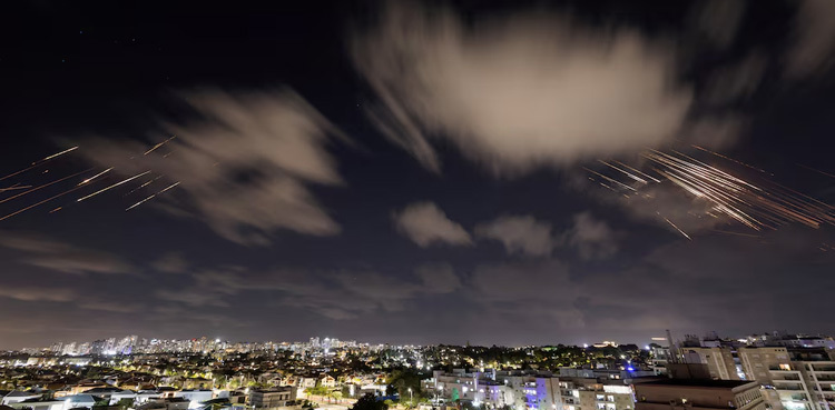 Israel vows response after Iran hits it with salvo of ballistic missiles