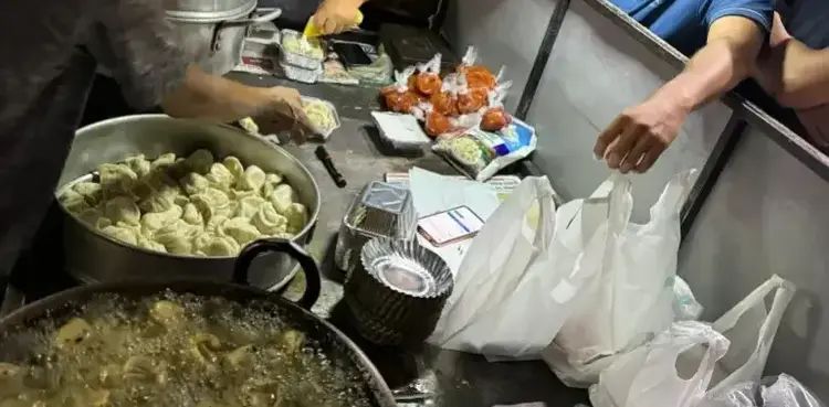 India woman dies after eating momos