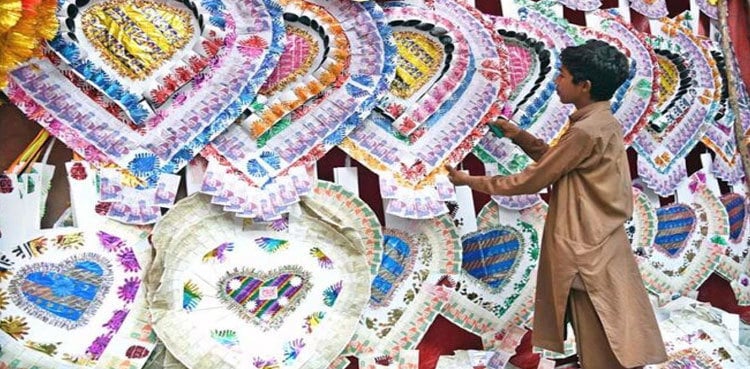 35-foot long currency garland for groom makes headlines