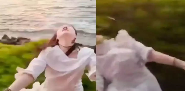 VIDEO: Woman falls from fast-moving train while making video