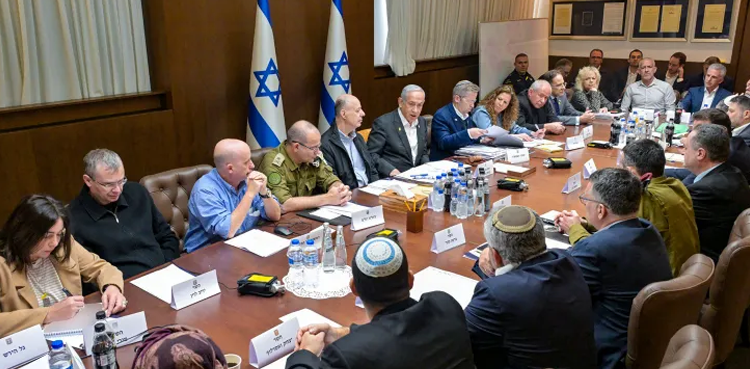 Israel approves Gaza ceasefire, carries out more attacks