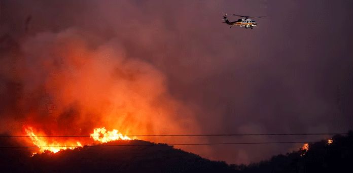 Los Angeles wildfire switches direction, posing new threat