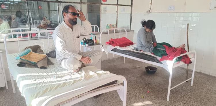 Man discovers missing wife lying next to him in hospital bed