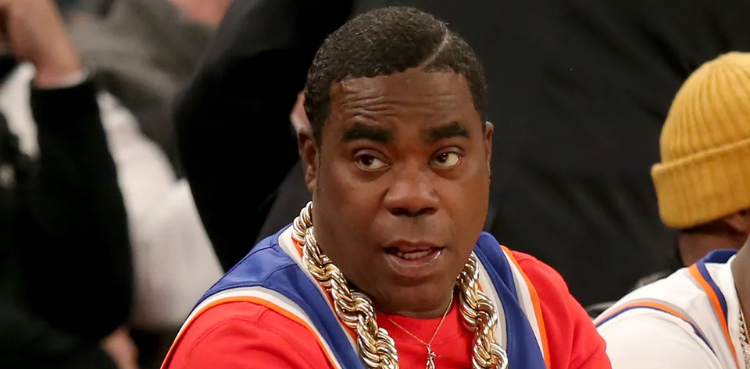 Actor Tracy Morgan rushed out in a wheelchair during NBA game