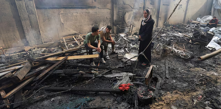 Israel kills at least 13 people in latest Gaza attacks