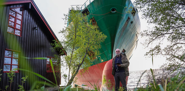 Norwegian man wakes to find cargo ship in his yard