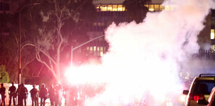Los Angeles police order immigration protesters in downtown to go home