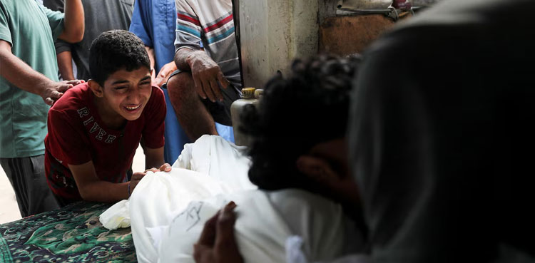 At least 32 killed by Israeli fire while seeking aid in Gaza, hospital says