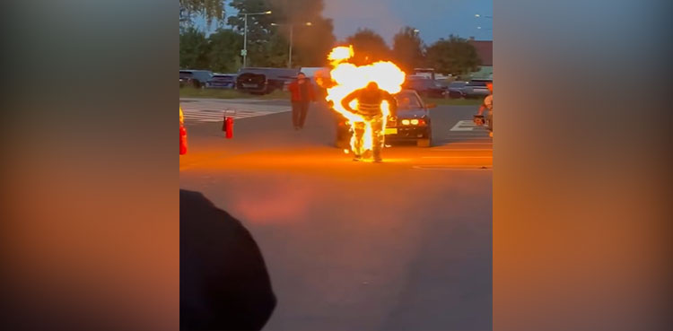 Video: Man sets Guinness World Record for car pull while on fire